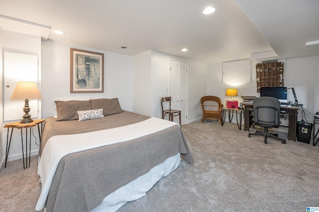 carpeted bedroom featuring a closet