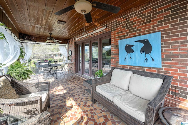 view of patio / terrace with ceiling fan and outdoor lounge area