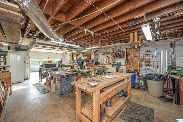 garage featuring a workshop area