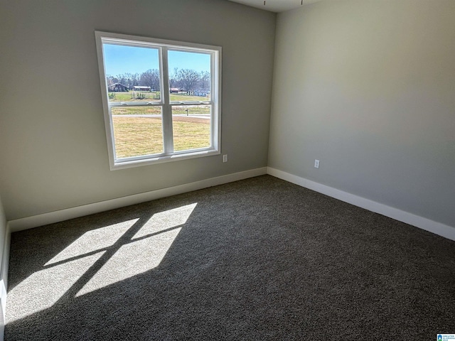 1465 Brooks Dr, Mount Olive, AL 35117 - unfurnished room with baseboards and dark colored carpet