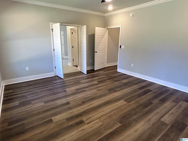 1465 Brooks Dr, Mount Olive, AL 35117 - unfurnished bedroom with baseboards, dark wood-style floors, and ornamental molding