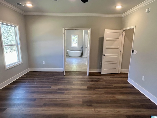 1465 Brooks Dr, Mount Olive, AL 35117 - spare room featuring visible vents, baseboards, ornamental molding, and dark wood finished floors