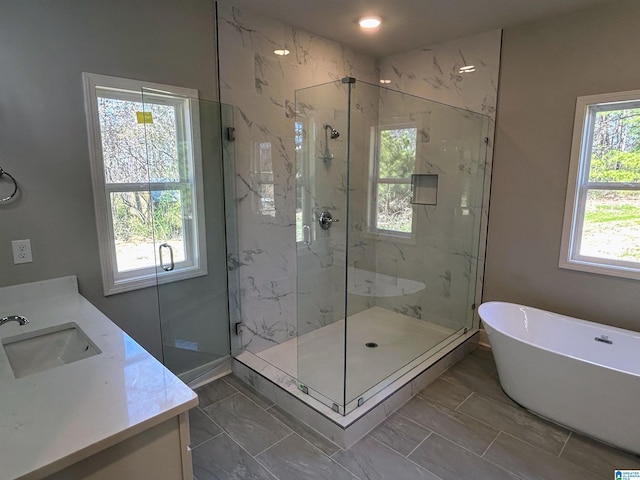 1465 Brooks Dr, Mount Olive, AL 35117 - full bathroom with a marble finish shower, a soaking tub, and vanity