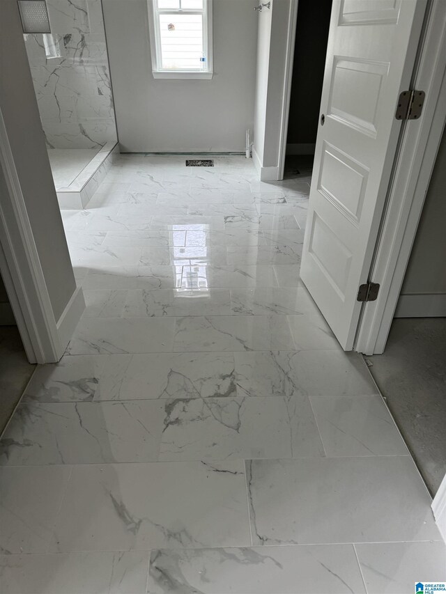 bathroom featuring tile patterned flooring