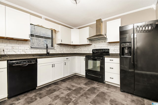 kitchen with white cabinets, wall chimney range hood, and black appliances