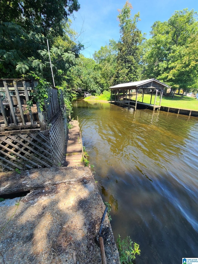 dock area featuring a water view