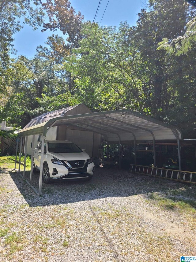 view of vehicle parking featuring a carport