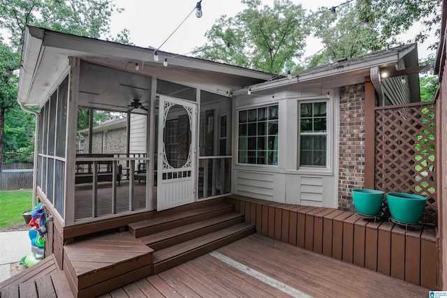 deck with a sunroom