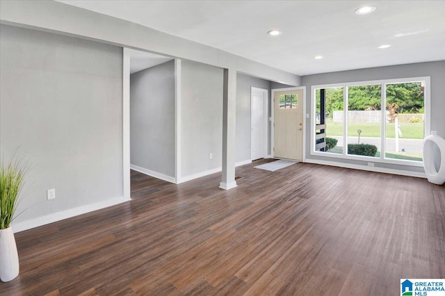 interior space with dark hardwood / wood-style flooring