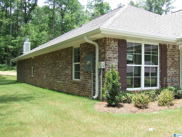 view of home's exterior featuring a lawn