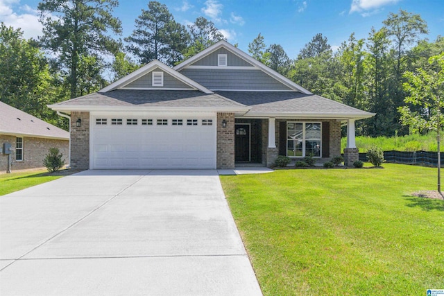 craftsman-style house with a front yard and a garage