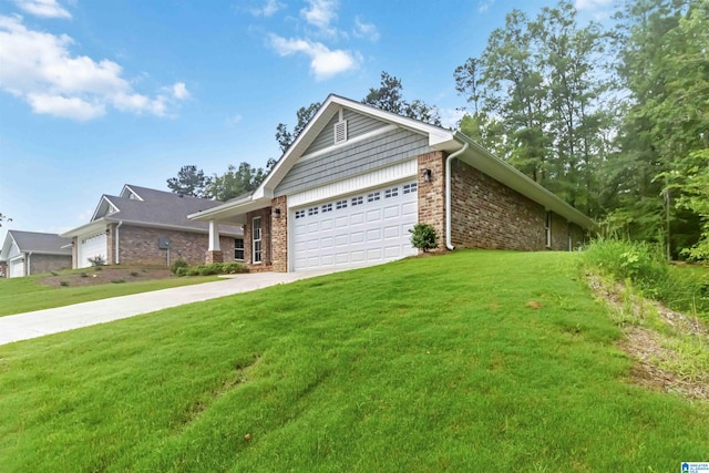 view of front of property featuring a garage and a front lawn