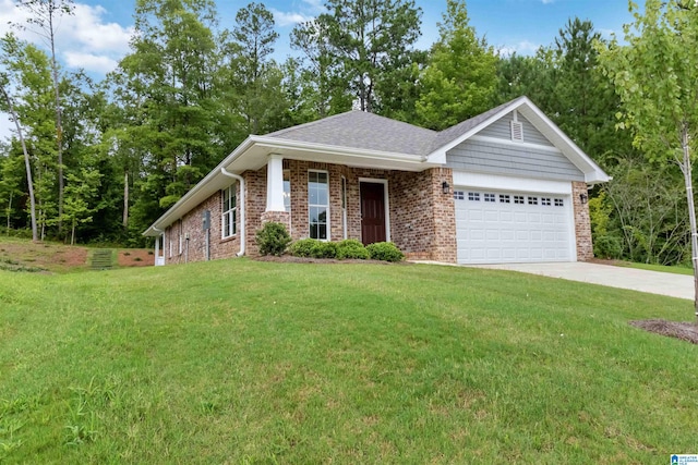 view of front of property with a garage and a front yard