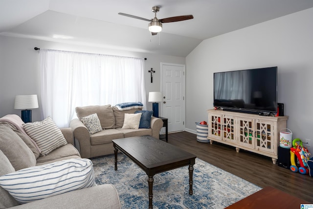 living room with ceiling fan, dark hardwood / wood-style flooring, and lofted ceiling