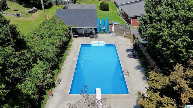 401 SW 8th St, Cullman, AL 35055 - view of swimming pool with a fenced in pool, fence, a yard, a diving board, and a patio area