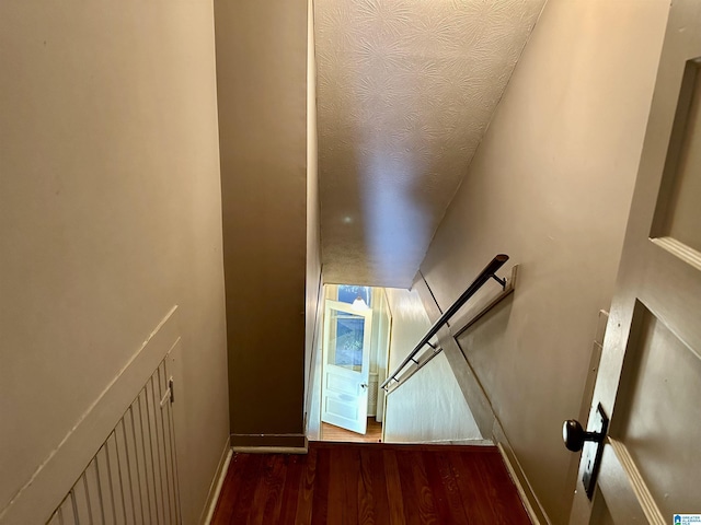 401 SW 8th St, Cullman, AL 35055 - stairs with baseboards and wood finished floors