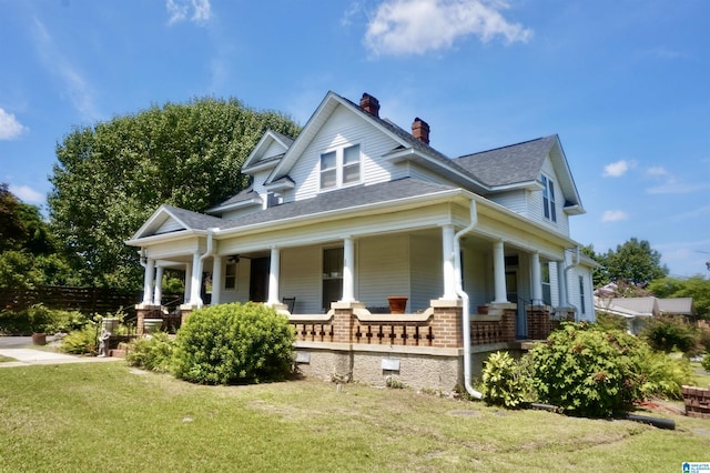 401 SW 8th St, Cullman, AL 35055 - view of side of property featuring a lawn, a porch, a chimney, and a shingled roof