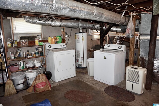 basement featuring washing machine and dryer and gas water heater