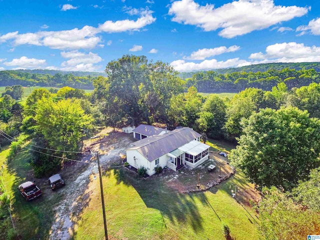 aerial view featuring a view of trees