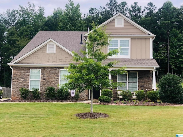 view of front of property with a front lawn