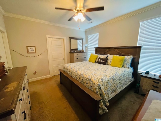 carpeted bedroom featuring ceiling fan and crown molding