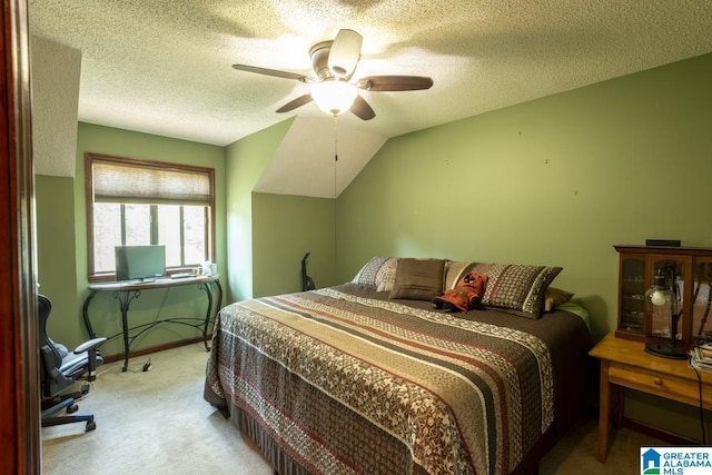 bedroom with a textured ceiling, ceiling fan, lofted ceiling, light colored carpet, and baseboards