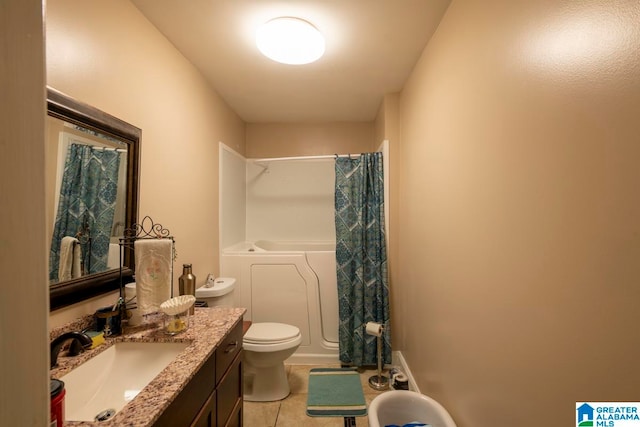 full bathroom with tile patterned flooring, shower / bathtub combination with curtain, vanity, and toilet