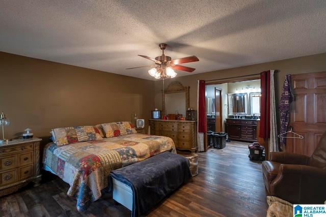 bedroom with a textured ceiling, ceiling fan, and dark hardwood / wood-style flooring