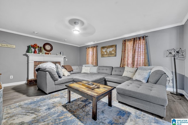 living room featuring crown molding, a brick fireplace, and dark hardwood / wood-style floors