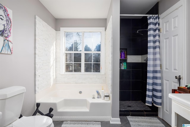 bathroom with toilet, shower with separate bathtub, and tile patterned flooring