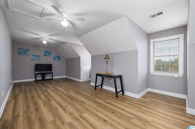 bonus room featuring lofted ceiling, ceiling fan, and light hardwood / wood-style flooring