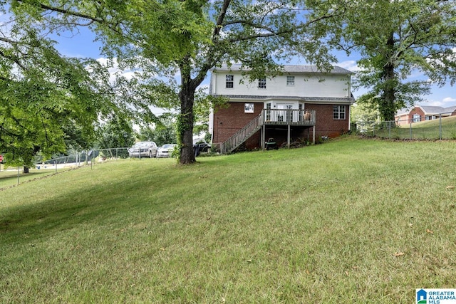 view of yard with a wooden deck