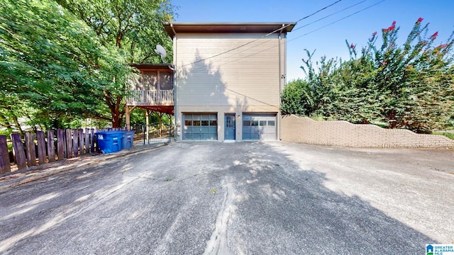 view of property exterior featuring a garage