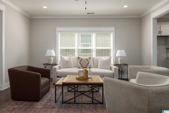 living room with crown molding and dark wood-type flooring