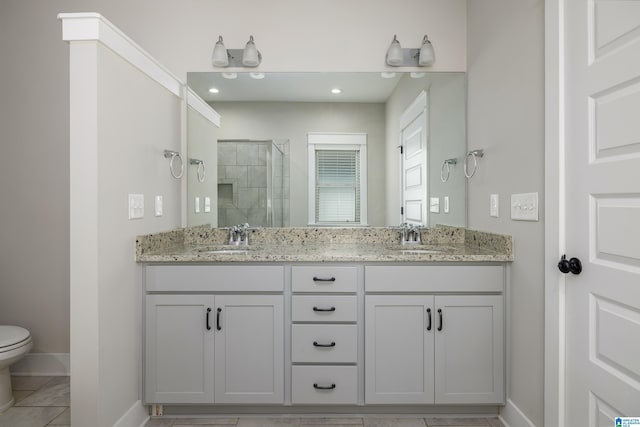 bathroom featuring vanity and walk in shower