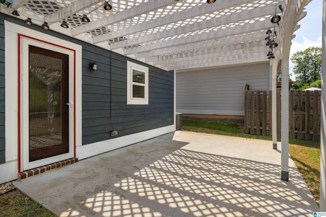 view of patio featuring a pergola