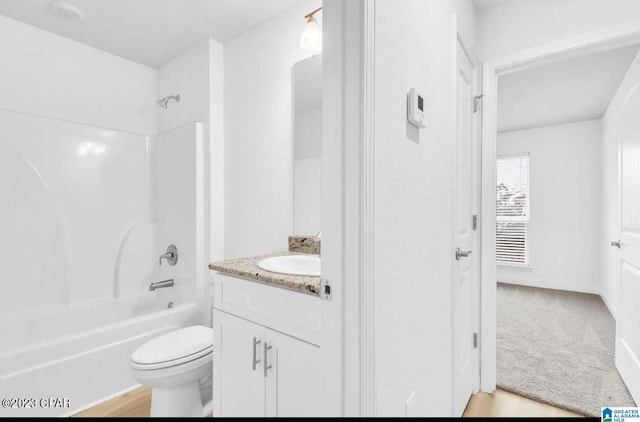 full bathroom featuring vanity, toilet, shower / bath combination, and wood-type flooring