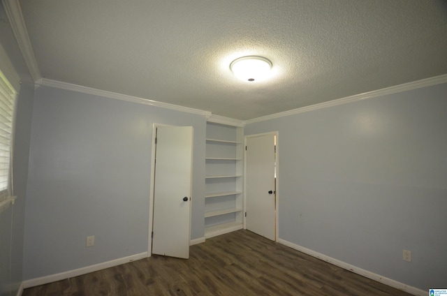 unfurnished bedroom featuring dark hardwood / wood-style flooring, ornamental molding, a textured ceiling, and a closet