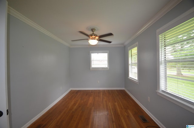 spare room with ceiling fan, crown molding, and hardwood / wood-style flooring