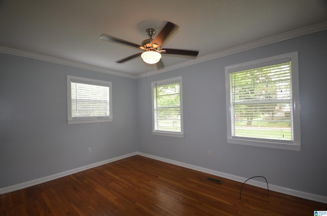 spare room with ceiling fan, hardwood / wood-style flooring, and crown molding