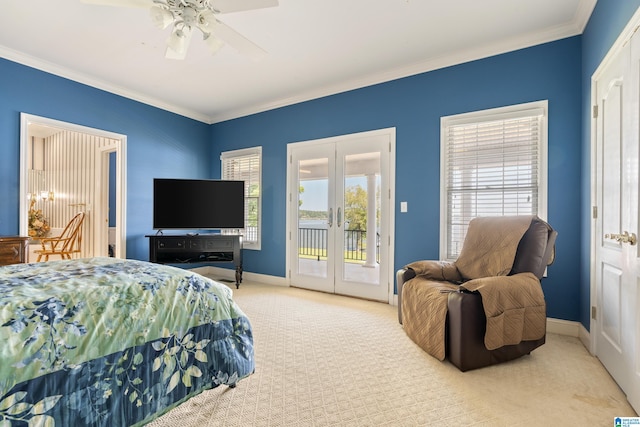 carpeted bedroom featuring access to outside, ornamental molding, french doors, and ceiling fan