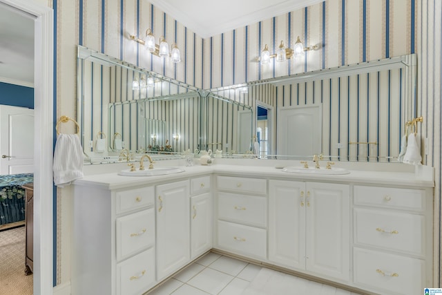 bathroom with crown molding, tile patterned floors, and vanity