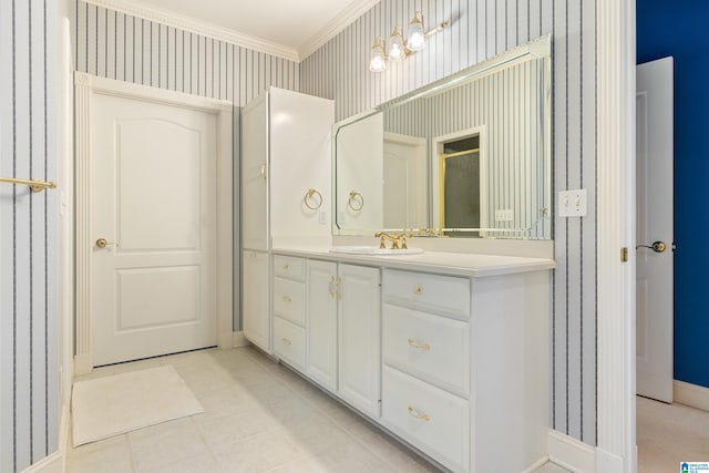 bathroom with vanity and ornamental molding