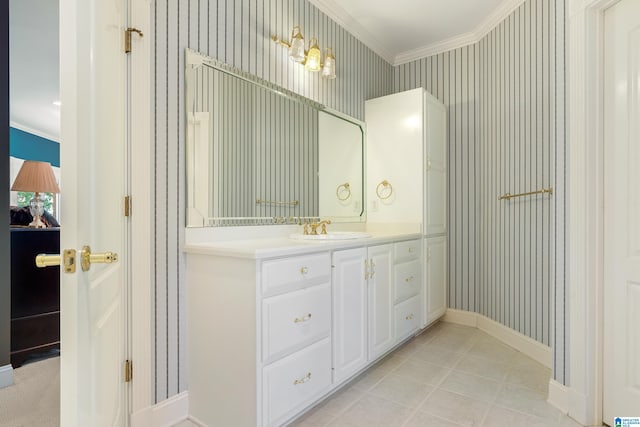 bathroom with vanity, tile patterned flooring, and ornamental molding