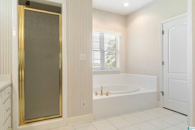 bathroom with vanity, separate shower and tub, and tile patterned flooring