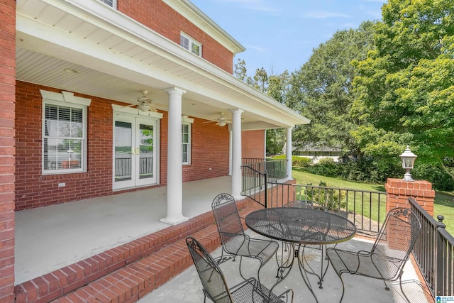 view of patio featuring ceiling fan