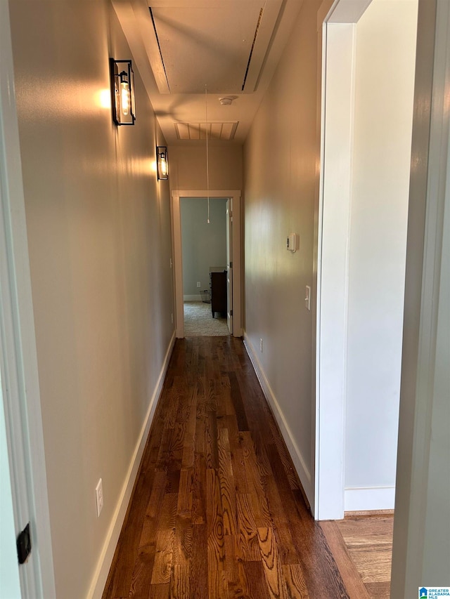 hall with dark hardwood / wood-style floors