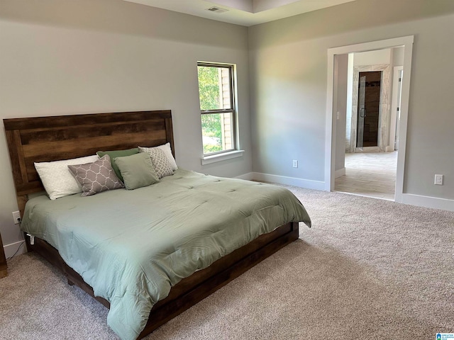 bedroom featuring carpet