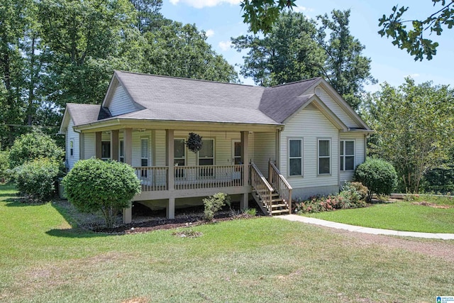 view of front of house with a front lawn and a porch