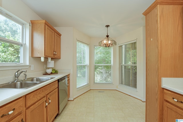 kitchen featuring a chandelier, stainless steel dishwasher, sink, light tile patterned floors, and hanging light fixtures